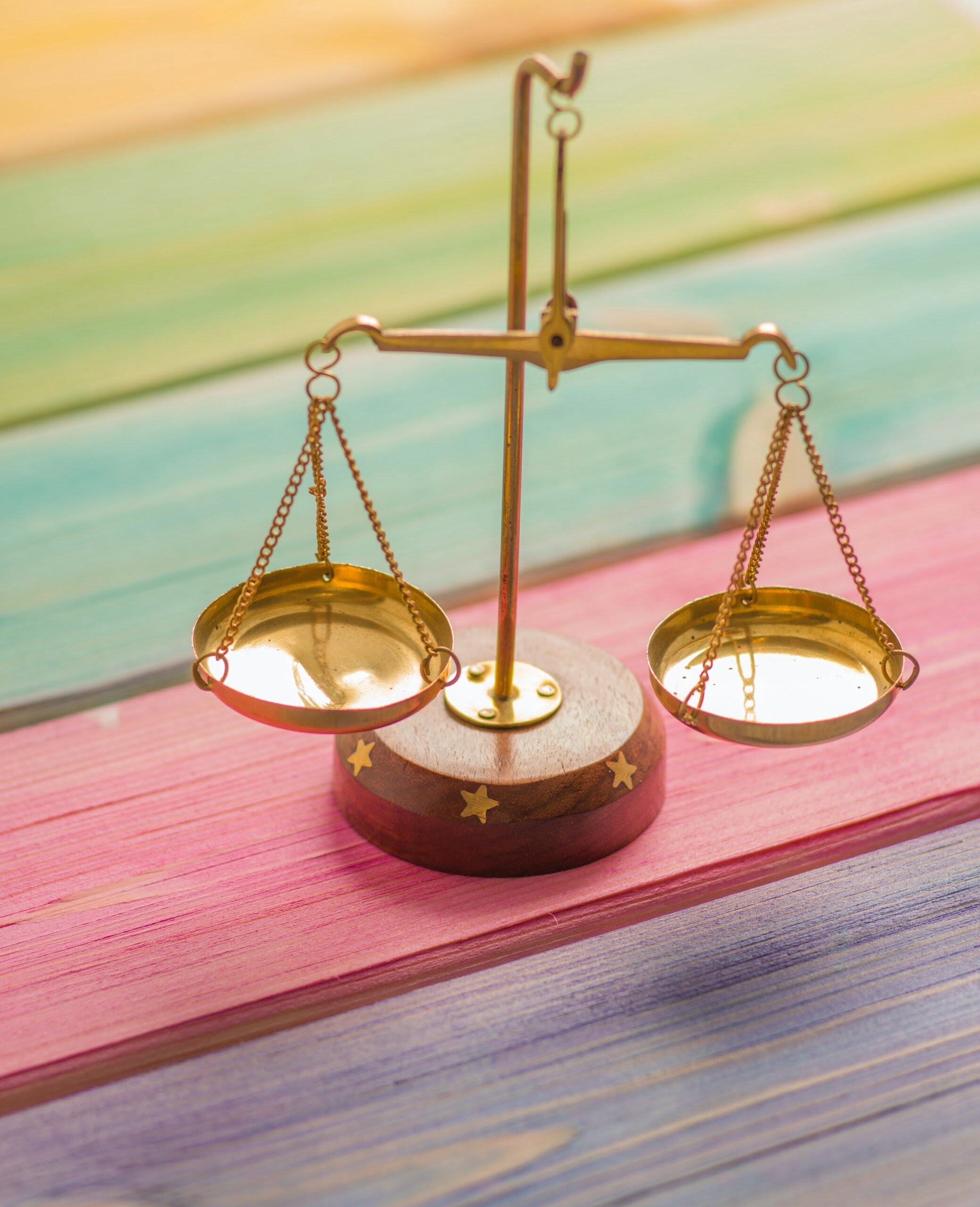 Copy of elena-mozhvilo-j06gLuKK0GM-unsplash Brass balance scales