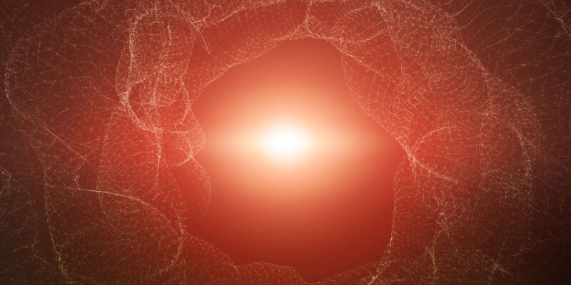 Abstract red and orange glowing background with intricate white web-like patterns around the glowing part